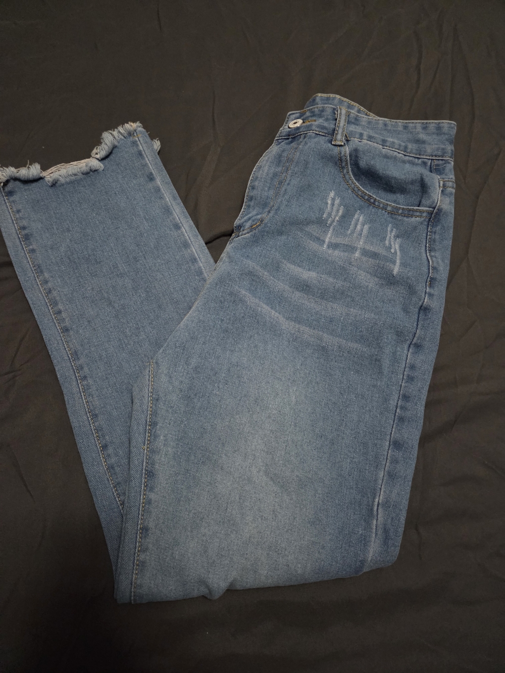Distressed Women’s Skinny High-Rise Light Blue Jeans with Frayed Hem